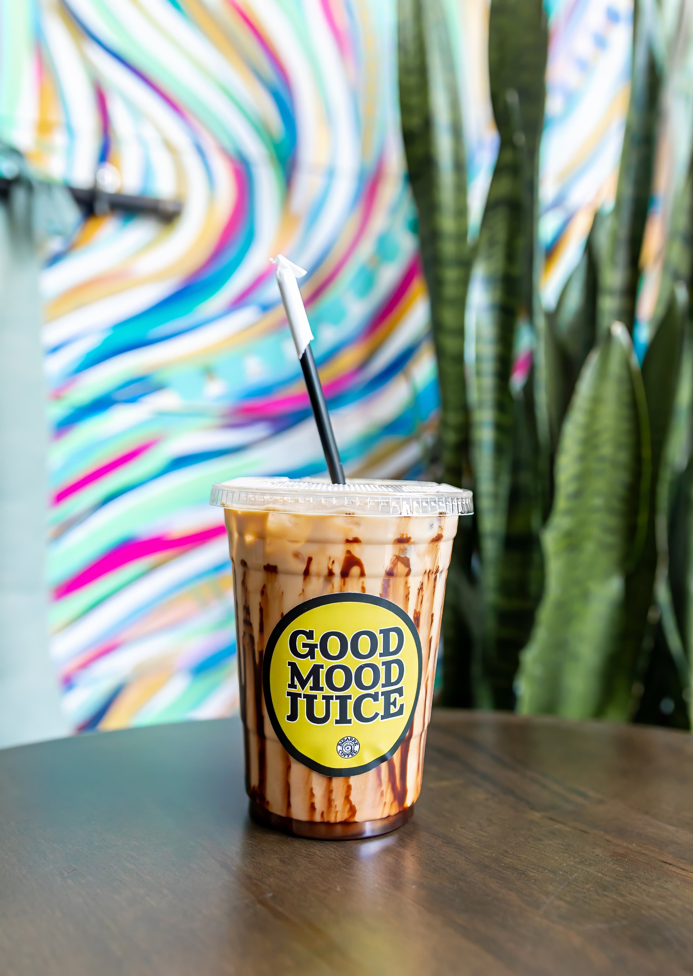 A chocolate drizzled latte.