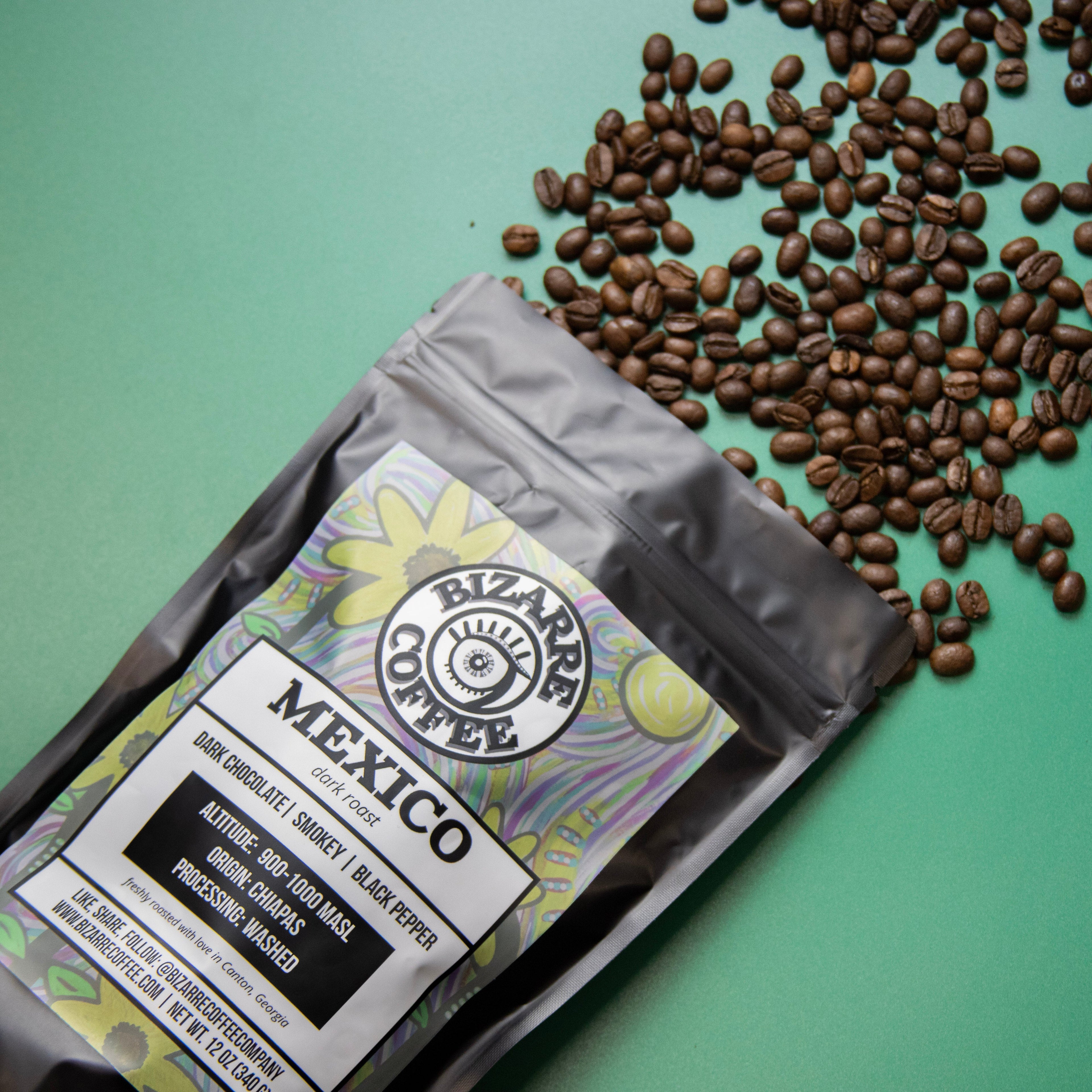 Rizzardi Coffee Mexico coffee package with coffee beans on a green background
