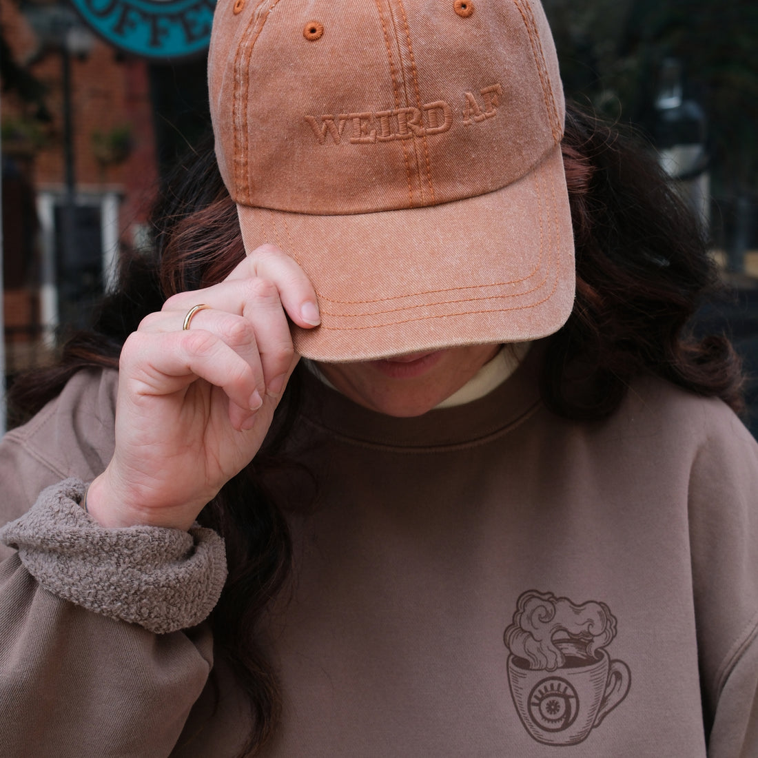 Person wearing a brown &